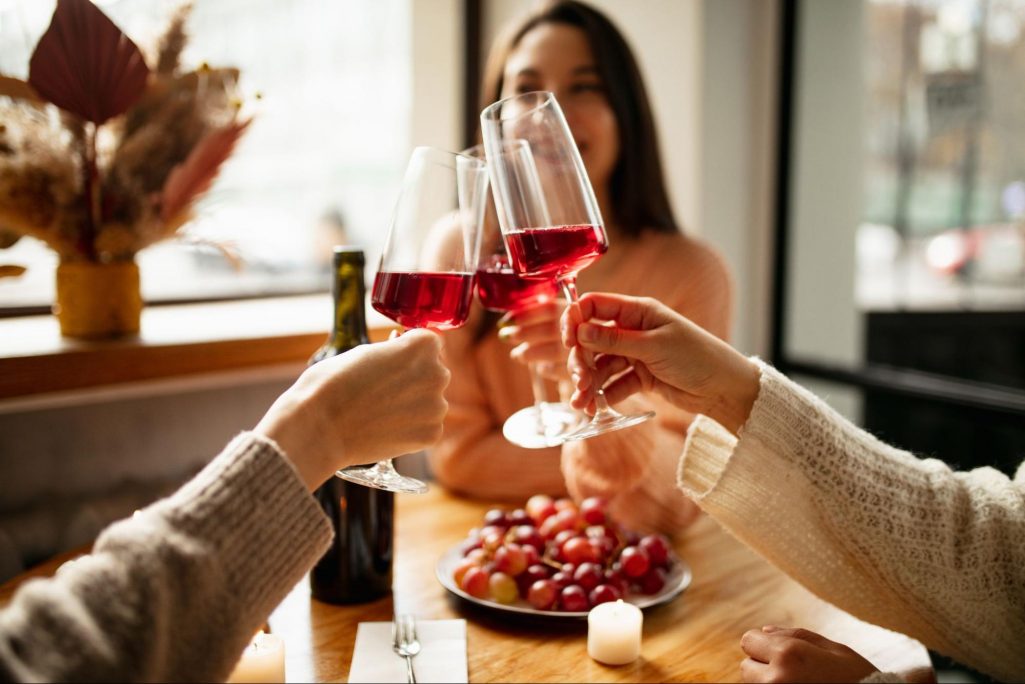 Friends drinking wine at a winery ©Anton Vierietin